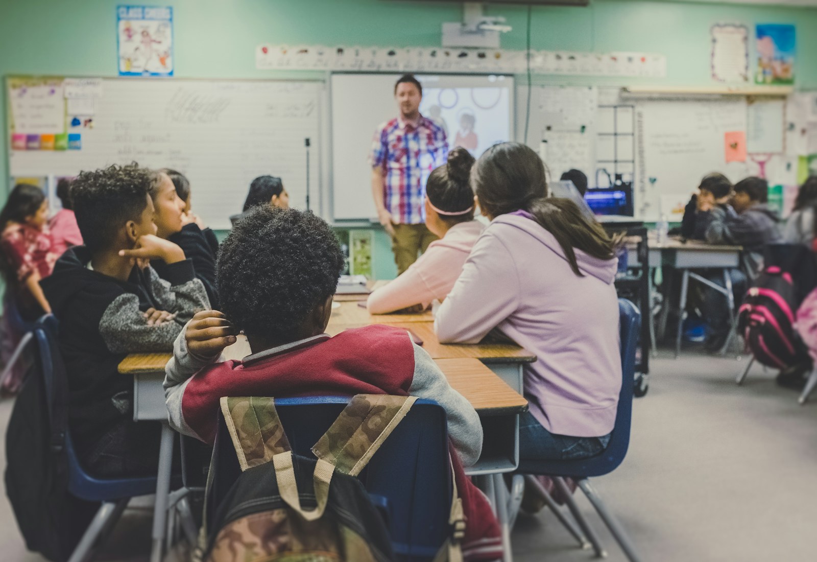 Students seated in a classroom during a lesson